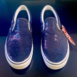 Brand new black sequence slip ons for women/men. Tag still on,box not included.